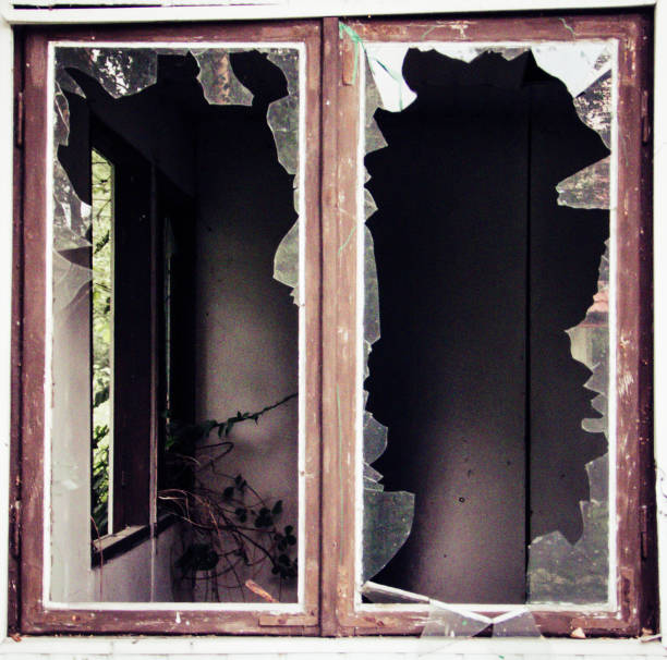 istock Broken window in the old abandoned building. 808718188