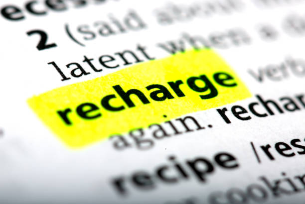istock Recharge is a word printed and highlighted in the English dictionary 808724432