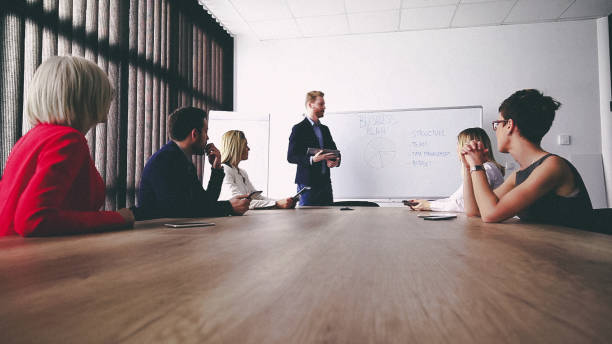 istock Business man presenting new ideas and projects to his team 808725434