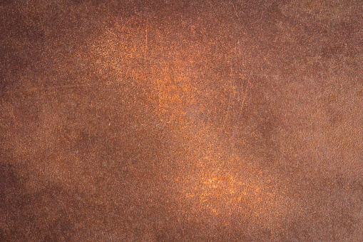 Close-up of weathered rusty metal texture background.