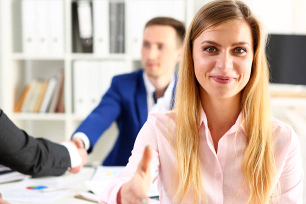 istock Businesswoman offer hand to shake as hello 808763826