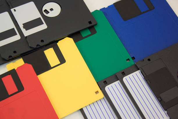 istock Group of multi-coloured floppy disks on the white background. 808764678