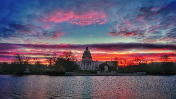 istock Sunrise of US Captiol at Captiol Reflecting Pool 808770346