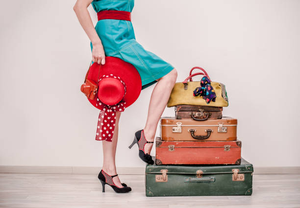 istock Woman Standing Beside Suitcases 808772728