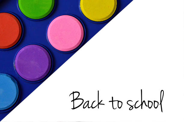 istock Back to school  text and watercolors in the corner 808779202