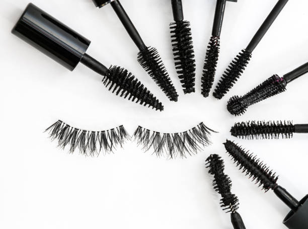 collection of a mascara brushes on white background. each one is shot separately collection of a mascara brushes on white background arranged in a circle with false eyelashes lash and brow comb stock pictures, royalty-free photos & images