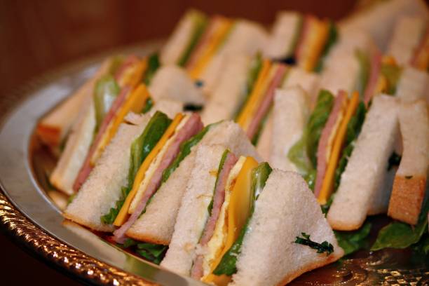 istock Slices of sandwiches in tray 808786734