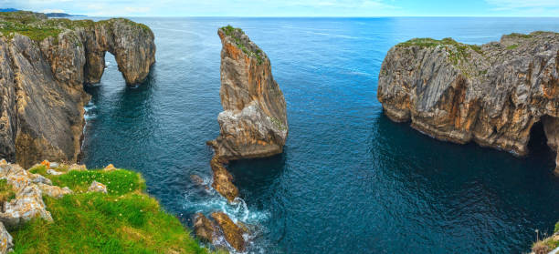 Bay of Biscay summer rocky coast view, Spain, Asturias, near Camango. Two shots stitch panorama.