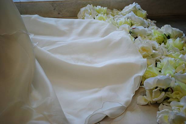 White wedding gown and roses