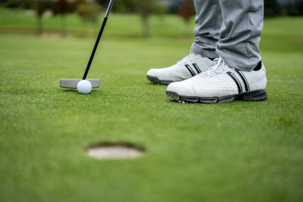 istock Close-up on a golfer hitting the ball 808828262