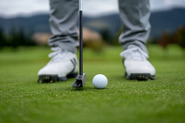 istock Close-up on a male golfer hitting the ball 808828614