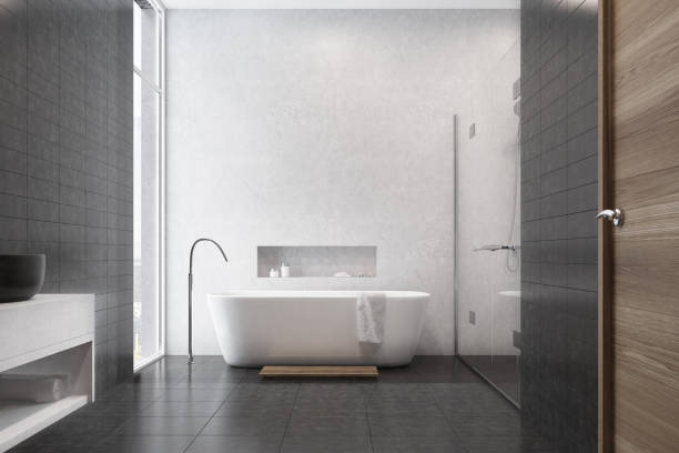 istock White bathroom, black tiles, sink 808935972