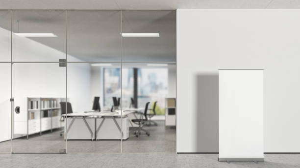 istock Blank roll up banner in modern office 808969038