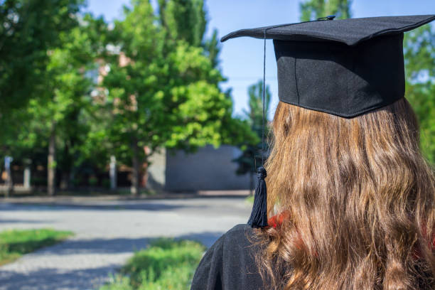 istock back of graduate on graduation day 808971112