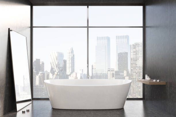 istock White tub, black room, window, close up 809001750