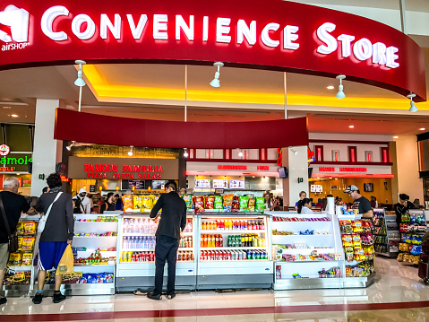 Cancun, Mexico - January 05, 2017:  Convenience Store at Cancun International Airport with people inside and outside the store.