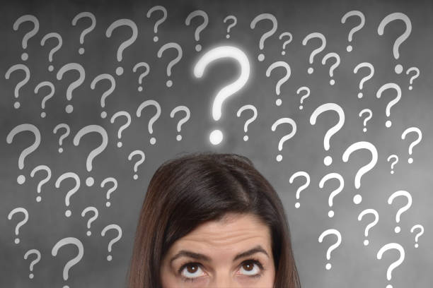 istock young woman with a question mark on her head 809025126