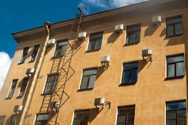 istock A typical residential house in the center with multiple air conditioners. 809026520