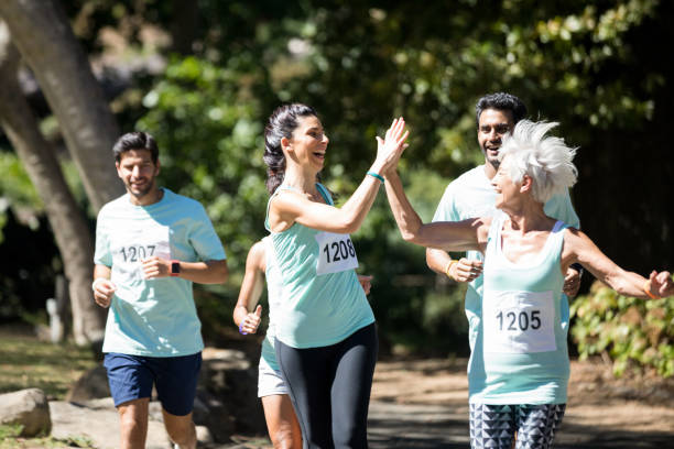 istock Marathon athletes walking in the park 809052620