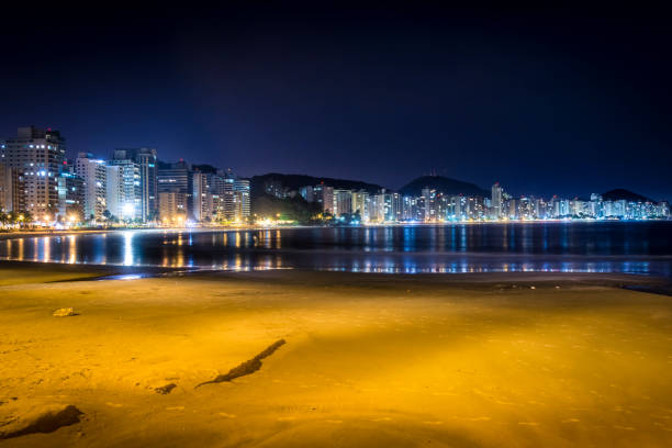 istock Guaruja, Asturias and Pitangueiras beach at night. 809063802
