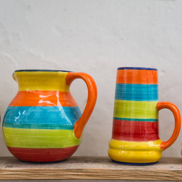 istock Colorful Empty Cups on Wooden Shelf 809064412