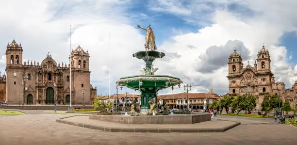 Photo of Panoramic view of Plaza de Armas with Inca fountain, Cathedral and Compania de Jesus Church - Cusco, Peru