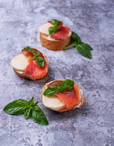 istock Crostini with salmon, mozarella, tomato and basil 809108290