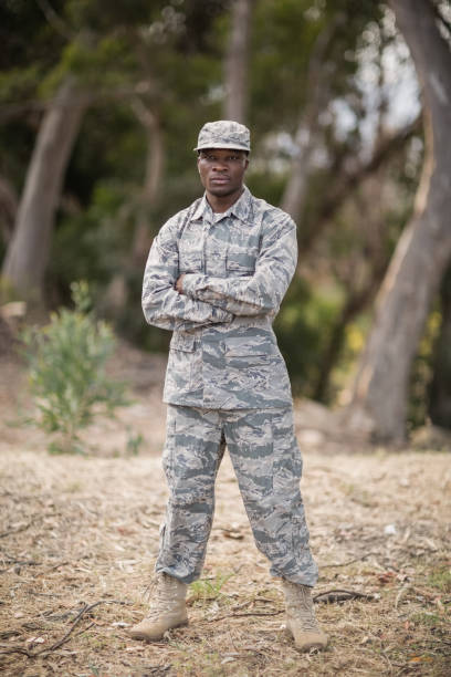 istock Military soldier standing with arms crossed 809139670