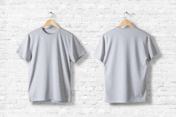 istock Blank Grey T-Shirts Mock-up hanging on white wall, front and rear side view . Ready to replace your design 809174916