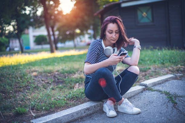 istock Young girl in the park 809191586