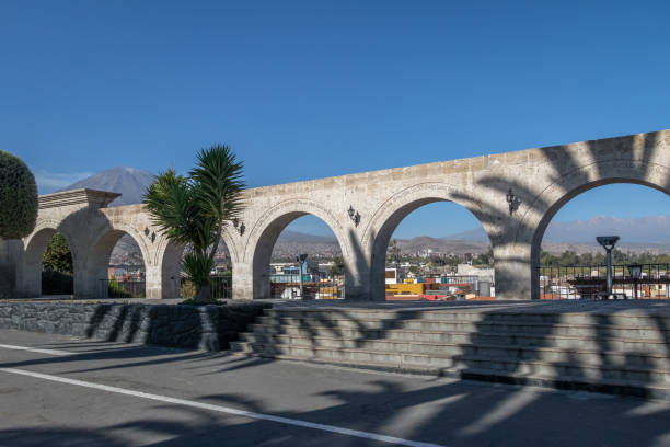 The Arches of Yanahuara Plaza and Misti Volcano on Background - written on the arches are quotes of famous people of the city - Arequipa, Peru The Arches of Yanahuara Plaza and Misti Volcano on Background - written on the arches are quotes of famous people of the city - Arequipa, Peru arequipa province stock pictures, royalty-free photos & images