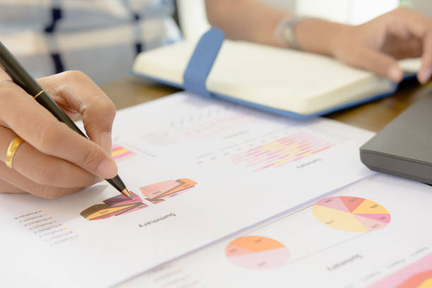 istock Businessman check seriously analyzes a financial reports. Financial reports are set of documents prepared by an administrative team at the end of an accounting period. Concept business finance 809214540