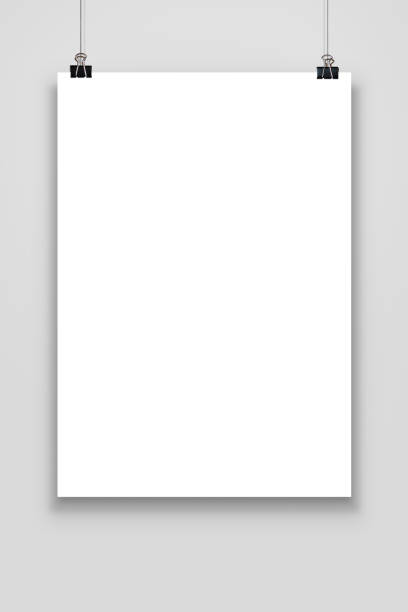 Blank paper poster mockup isolated on a gray background.
