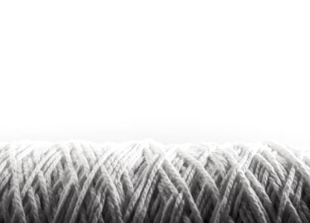 istock Roll of white rope isolated on white background 809227994