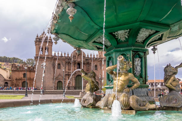 istock Inca Fountain and Cathedral at Plaza de Armas - Cusco, Peru 809265636