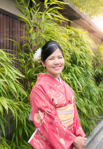 istock asian woman wearing red kimono 809287422