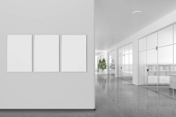 Blank poster on the wall in modern office interior