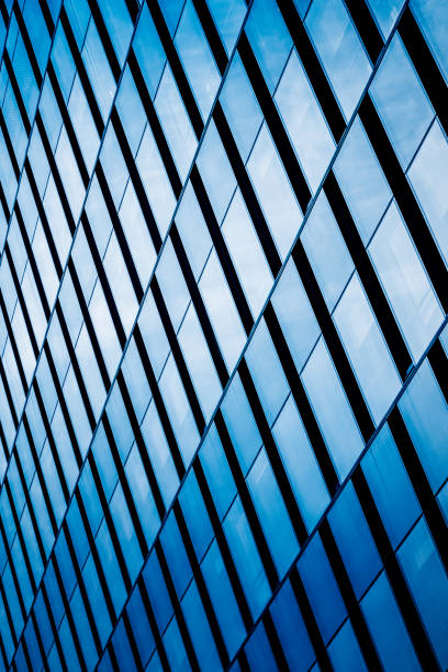 istock Modern office architectur at blue glass wall backgrounds 809297506