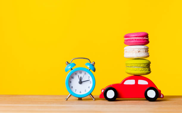 istock macaroons, alarm clock and toy 809299126