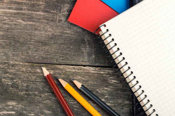 istock Back to School, supplies, notebook on the grey background, top view 809304862