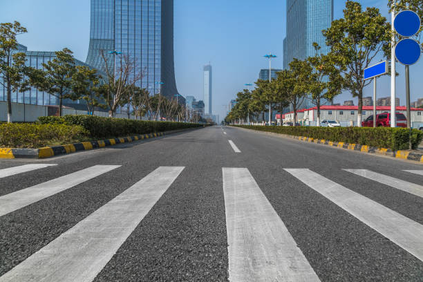 istock City empty traffic road with cityscape in background 809309558