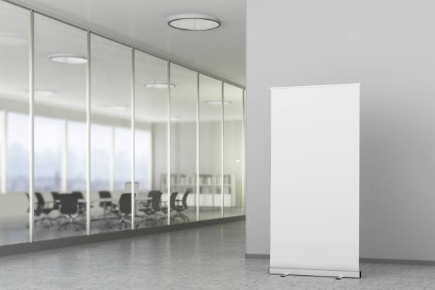 istock Blank roll up banner stand in modern office interior 809313612