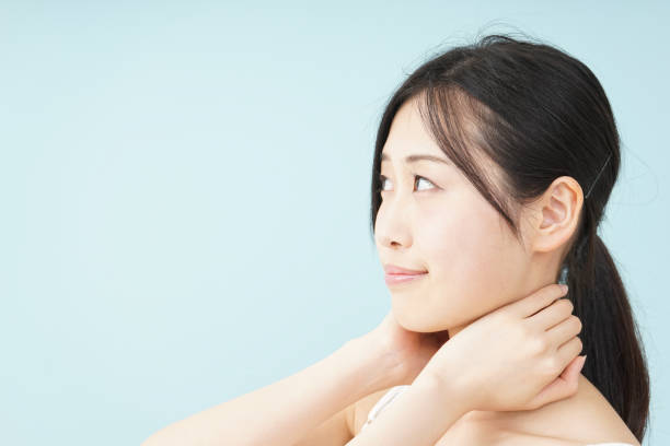 istock Young woman taking a body care 809425724