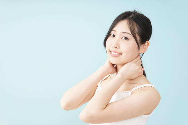 istock Young woman taking a body care 809425806