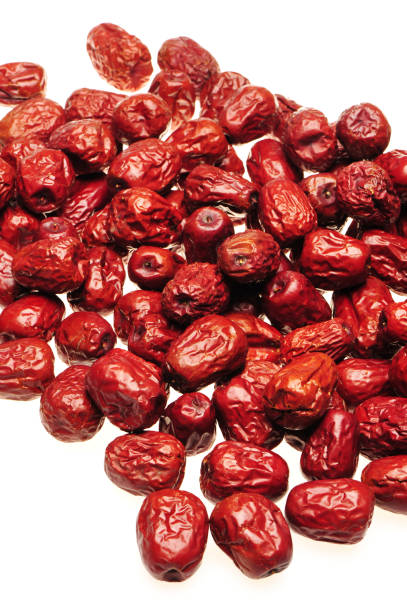 istock Dry red jujubes   on white background 809479348