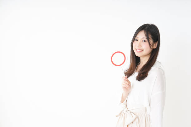 istock Young woman showing the circle sign 809494340