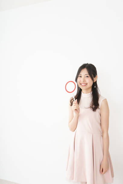 istock Young woman showing the circle sign 809495494
