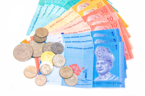 istock bank note of Ringgit Malaysia and coin 809504710