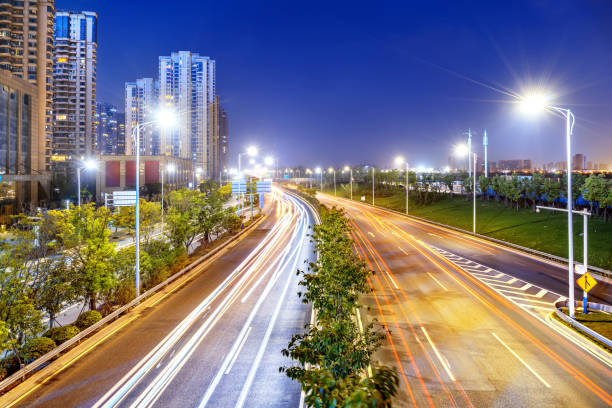 city busy traffic night view. - blue streak lights imagens e fotografias de stock