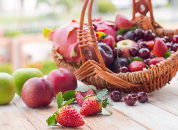 istock Mixed fresh fruits in basket 809558766